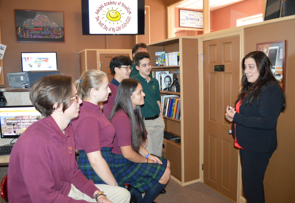 Head of School Ms. Iphigenia Romanos speaks to members of Adelphi Academy of Brooklyn's incoming Student Advisory Board inside the Technology & Design Laboratory!