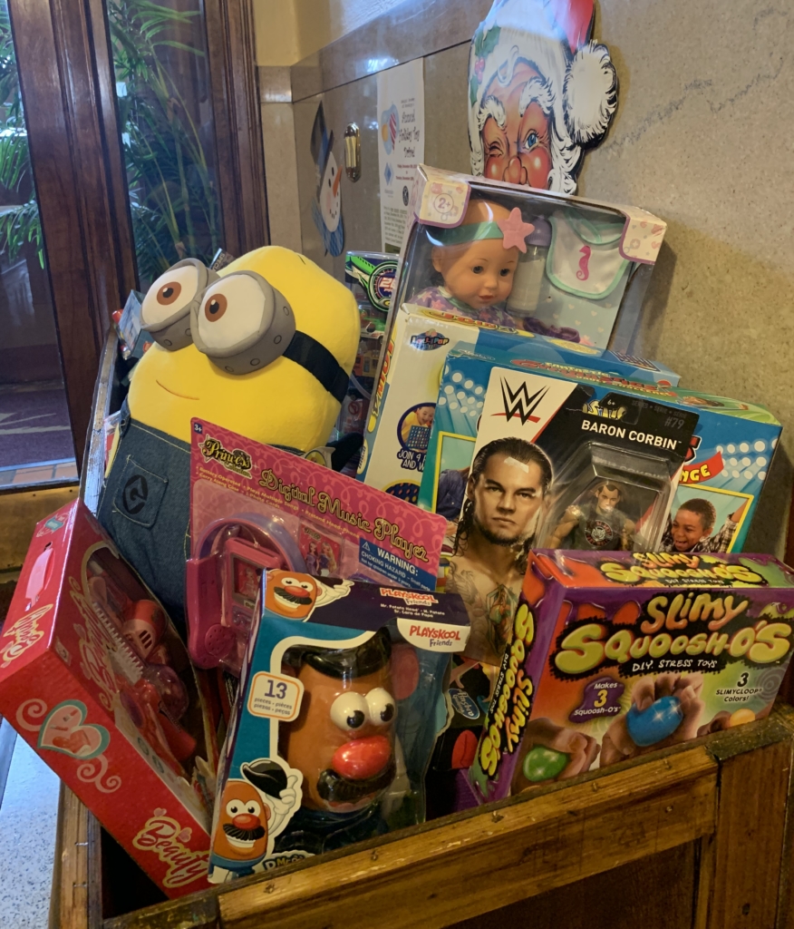 Adelphi Academy's Holiday Toy Drive collection bin overflows with generous donations!