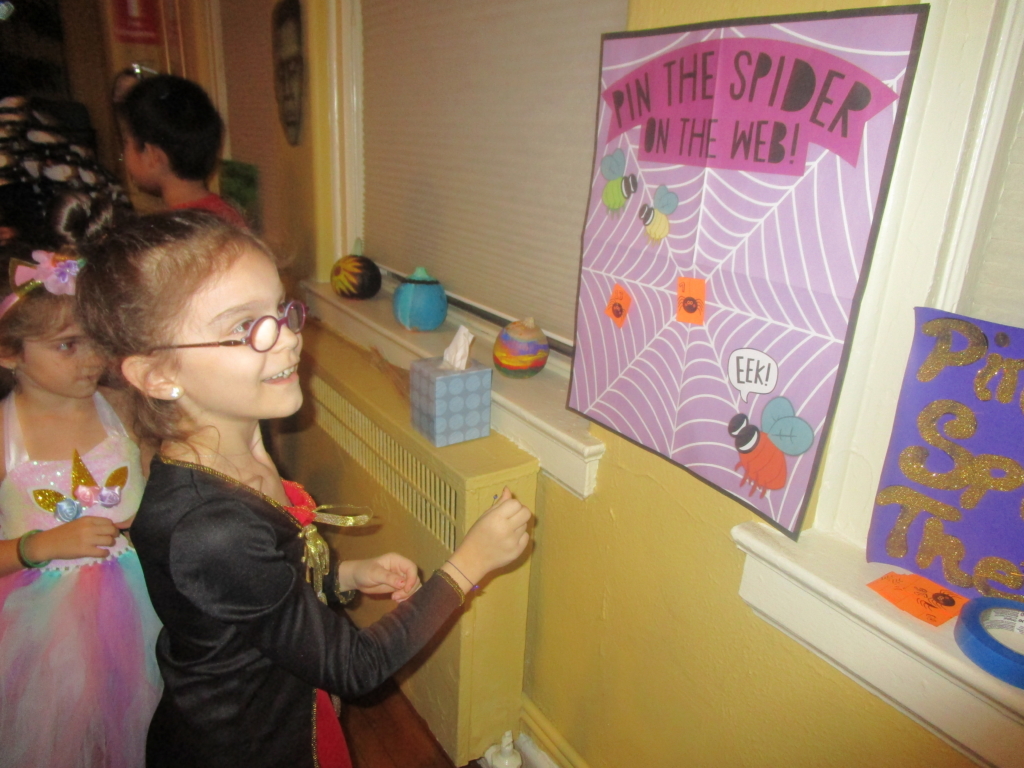 Lower Schoolers enjoyed Halloween-themed games and activities, like Pin the Spider on the Web!