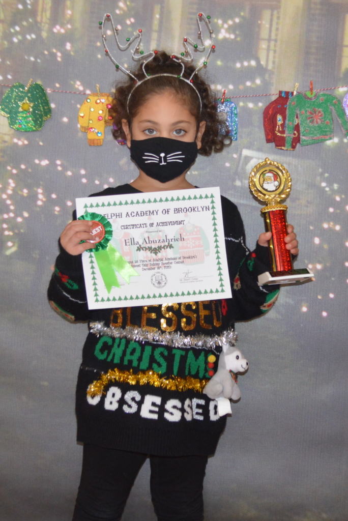 Ella won first prize in the Lower School Ugly Holiday Sweater Contest!